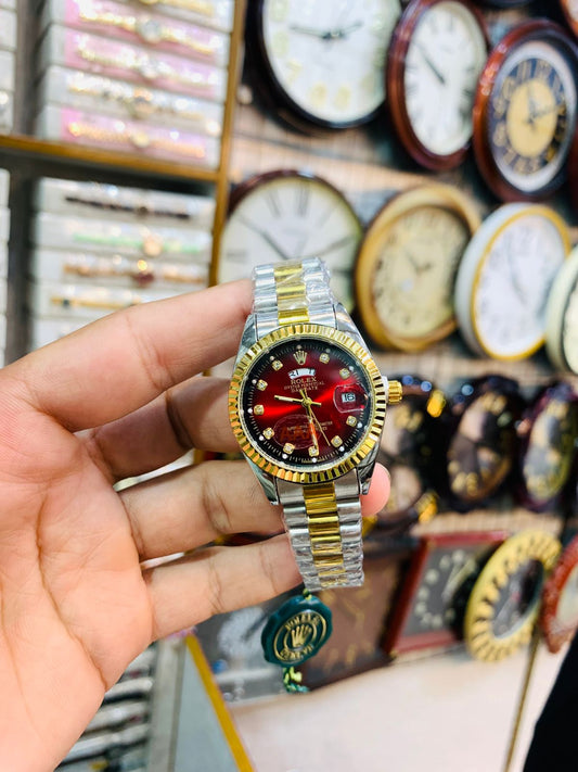 Fashionable two-tone ladies wrist watch featuring a red dial and luxury finish