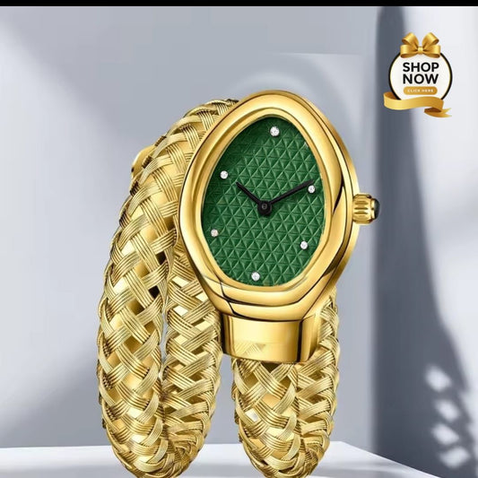 Gold wristwatch with green face on a gray background